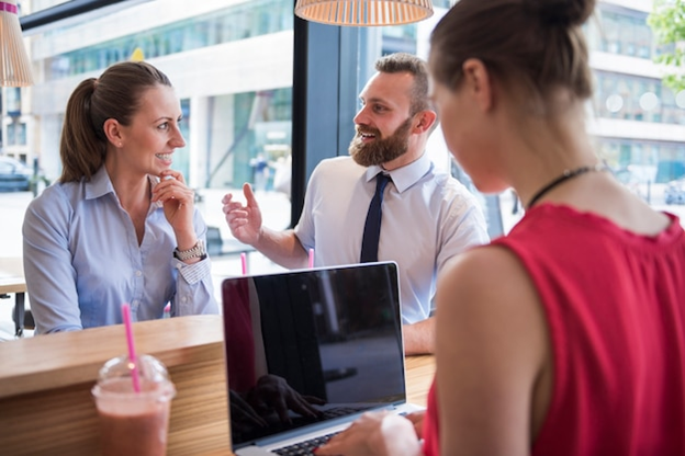 Different hotel managers conducting meetings. 