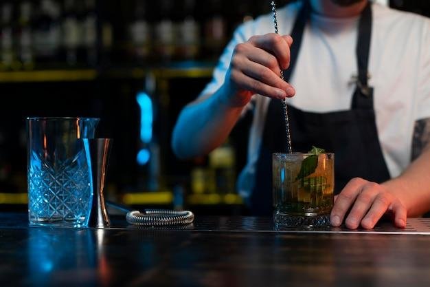 hotel bartender preparing a cocktail